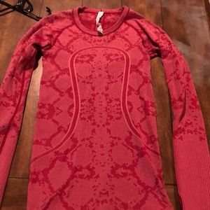 Red snake skin lululemon long sleeve.
